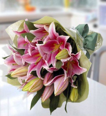 Bunch of 5 Stems of Pink Lilies with greens in nice wrapping paper Thinking of You