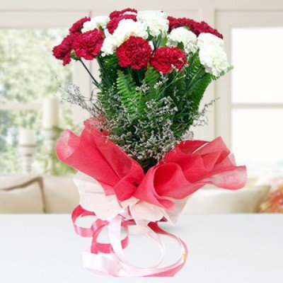Bunch of 10 Red & White Carnations with seasonal fillers with red & White wrapping Paper Graceful Bunch