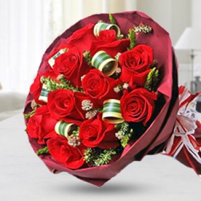 Bunch of 12 Red Roses with greens in Red wrapping (same as picture) Simply Elegant Beauty