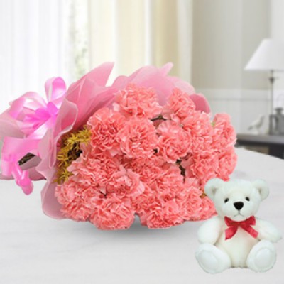 Bunch of 10 Pink Carnations with fillers in pink paper packing and pink ribbon with 6 Inches Teddy Bear 10 Pink Carnations & Teddy