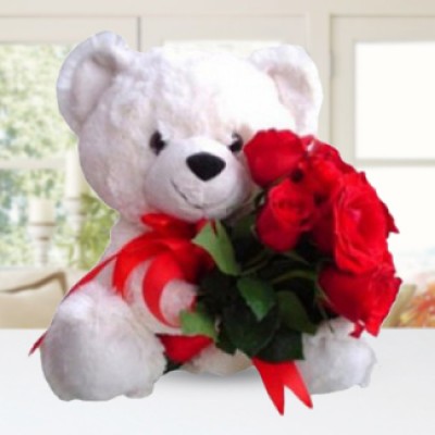 Send this Awesome Combo of 10 Red Roses with fillers in nice wrapping with a Huggable Teddy of 24 Inches (approx). Sweet Seduction