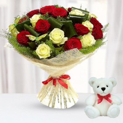 Bunch of 12 Red & Yellow Roses with White Fillers in nice wrapping paper along with 6 Inch Teddy Bear Red & Yellow Roses with Teddy