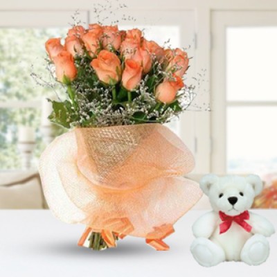 Bunch of 15 Orange Roses in nice net wrapping along with 6 Inch Teddy Bear 15 Orange Roses & Teddy