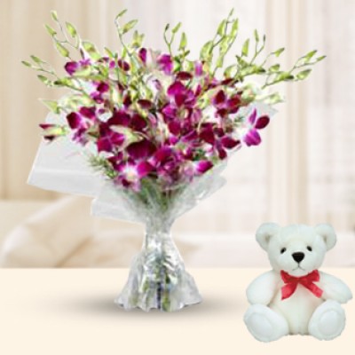 Bunch of 10 Purple Orchids in nice net wrapping along with 6 Inch Teddy Bear 10 Purple Orchids & Teddy