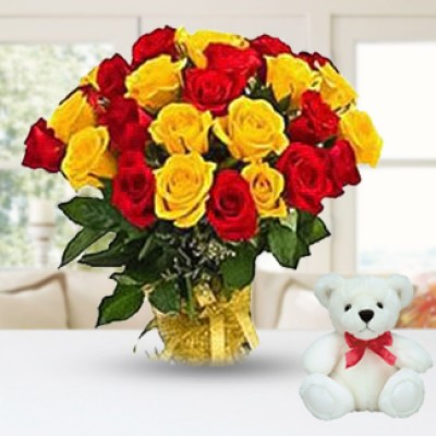 Bunch of 25 Red and Yellow colour roses in paper packing along with 6 Inch Teddy Bear 25 Red & Yellow Roses with Teddy