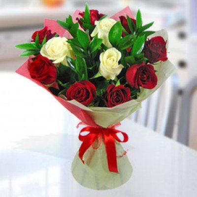 Bunch of 12 Red & White Roses with greens and nice wrapping paper Perfect Choice