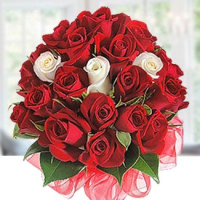 Bunch of 18 Red Roses & 3 White Roses with greens in Red Net She's Lovely
