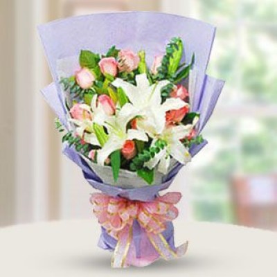 Bunch of 3 stems of white lilies, 16 pink roses with greens and fillers in nice wrapping Tenderness Feelings