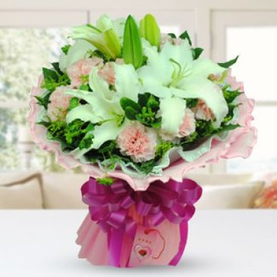 Hand banquet of 3 white lilies and 15 pink carnations with greens in light pink package Carnations whishes