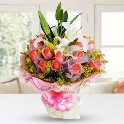 Bunch of 15 peach roses & 2 stems of white lilies with greens in nice wrapping Peaceful Bouquet