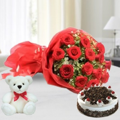 Bunch of 20 Red Roses with Seasonal fillers in nice wrapping paper along with 1/2 Kg Black Forest Cake& 6 Inch Teddy Bear Exotic Combo