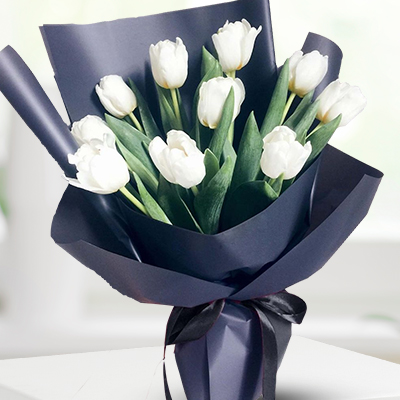 Bouquet of 12 stems of White Tulips in nice black wrapping (Same as Picture) Elegant White