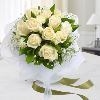 Bunch of 12 White Roses with fillers in nice white wrapping Innocence