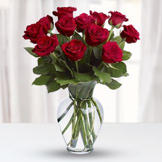 12 Red Roses in a Glass vase Someone Special