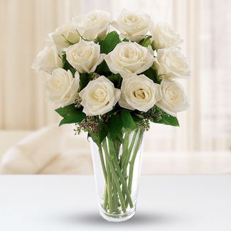 12 White Roses with fillers in a Glass Vase Pure Life