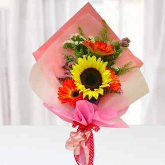 Bunch of 1 Sunflower and 3 Orange Gerberas with fillers in nice wrapping Lovely Sun