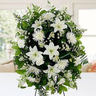 Stand funeral arrangement of White flowers Deepest Sympathy