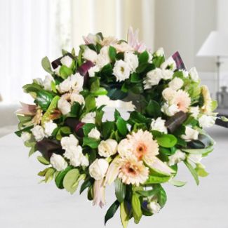 Wreath Arrangement of pastel color flowers with lot of greens Pastel Peace