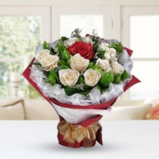 Bunch of 12 White Roses and 1 Stem Ecuadorian Red Rose with fillers in nice wrapping My One True Love