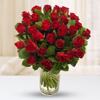 30 Red Roses with greens in a Glass Vase Dark red roses
