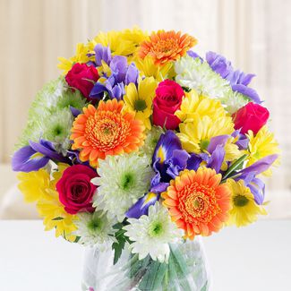 Bunch of 3 Orange Gerbera , 4 Pink roses , 2 Purple statis , 4 stems of yellow and white chrysanthemums with fillers and nice wrapping Lovers