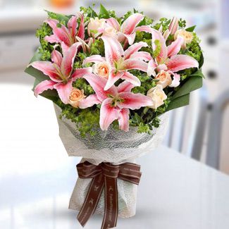 Bouquet of 6 Stem Stargazer and 12 Stem Pink Roses with fillers in nice wrapping Oriental Blooms
