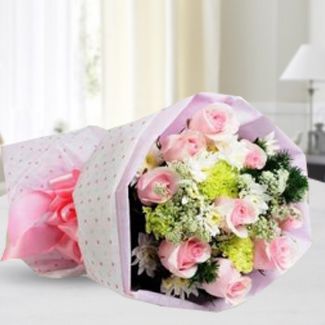 Bunch of 12 Pink Roses and 2 stems of white Chrysanthemums and white Fillers in nice wrapping Kisses